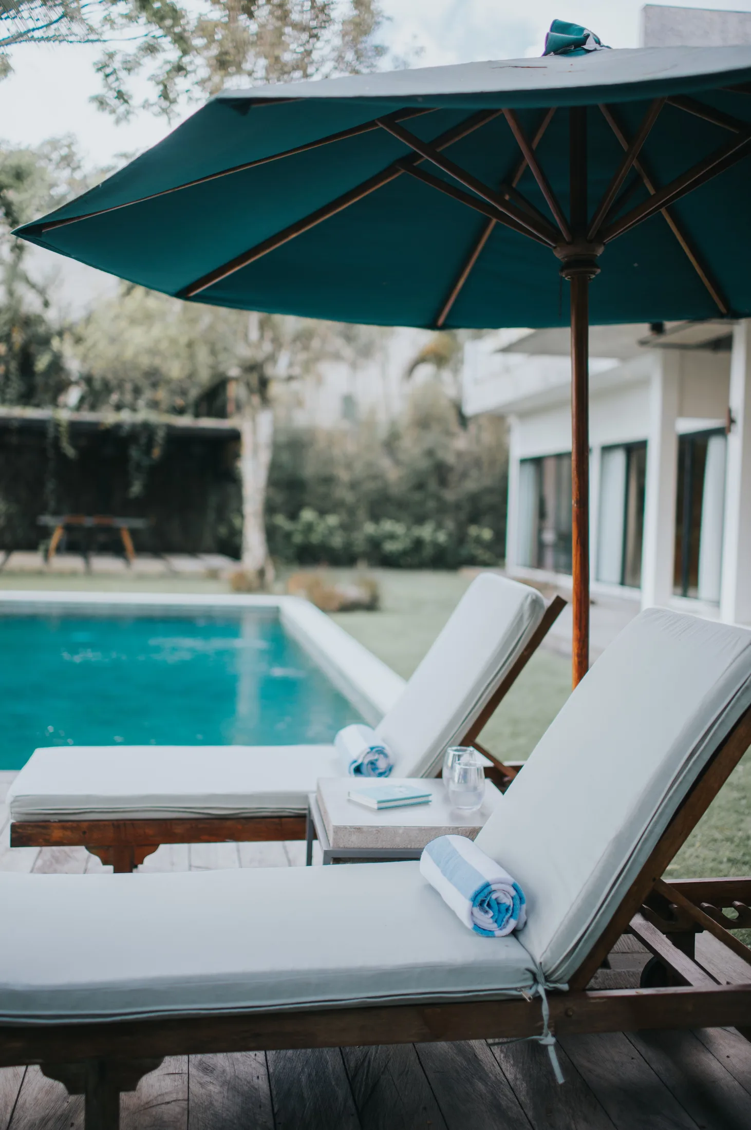 Poolside terrace and villa facade