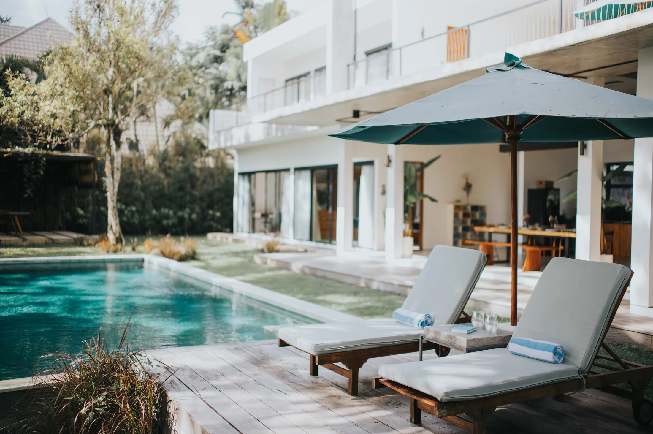 Pool bordered by tropical planting